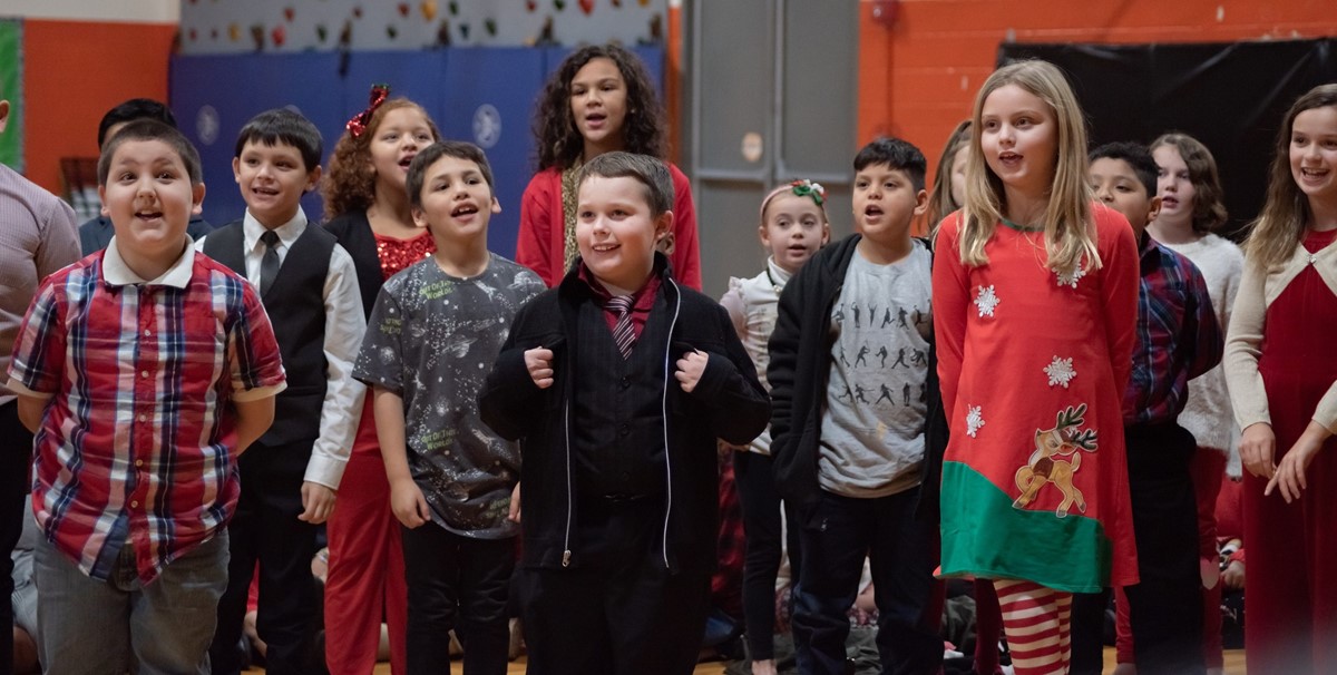 Elementary School students singing in a Christmas Play