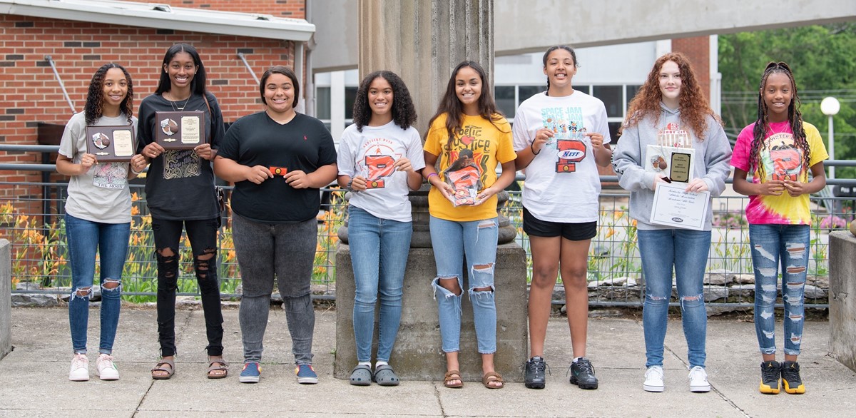 Girls Basketball Players Receiving Awards