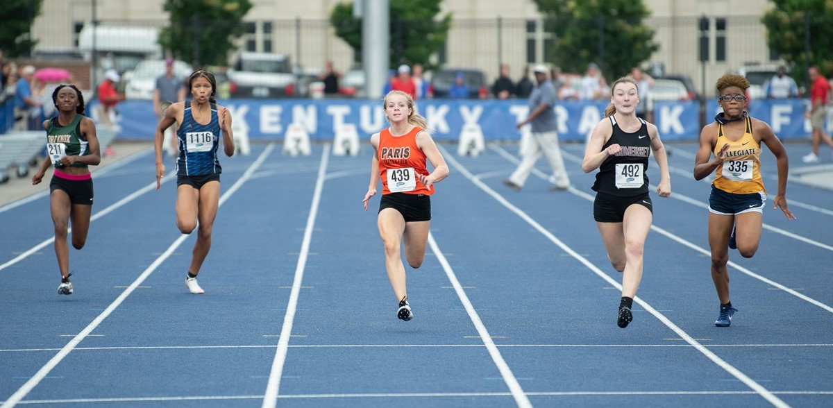 Girl running track