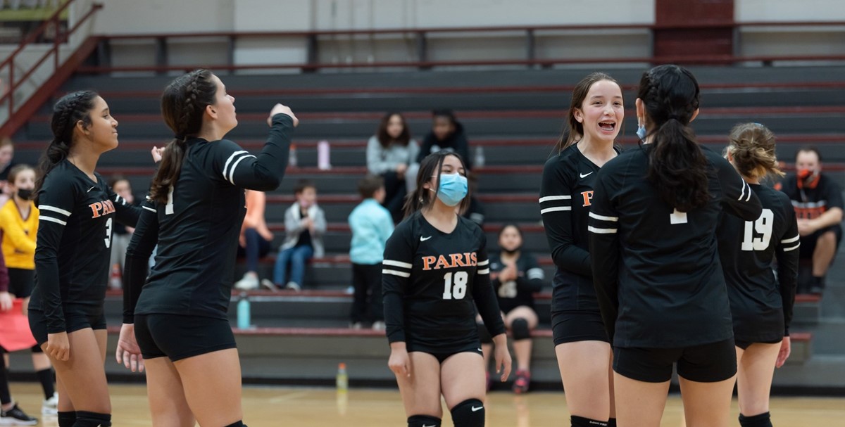 Middle School Volleyball Team Celebrating