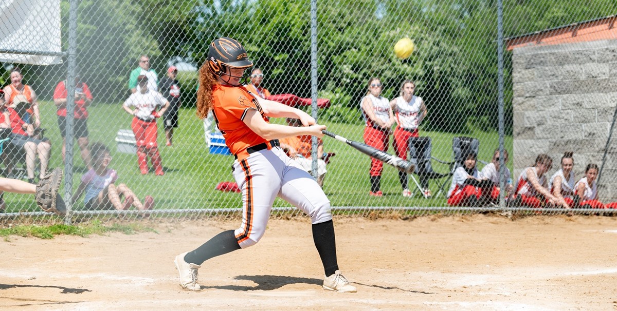 Paris Softball Player hitting ball